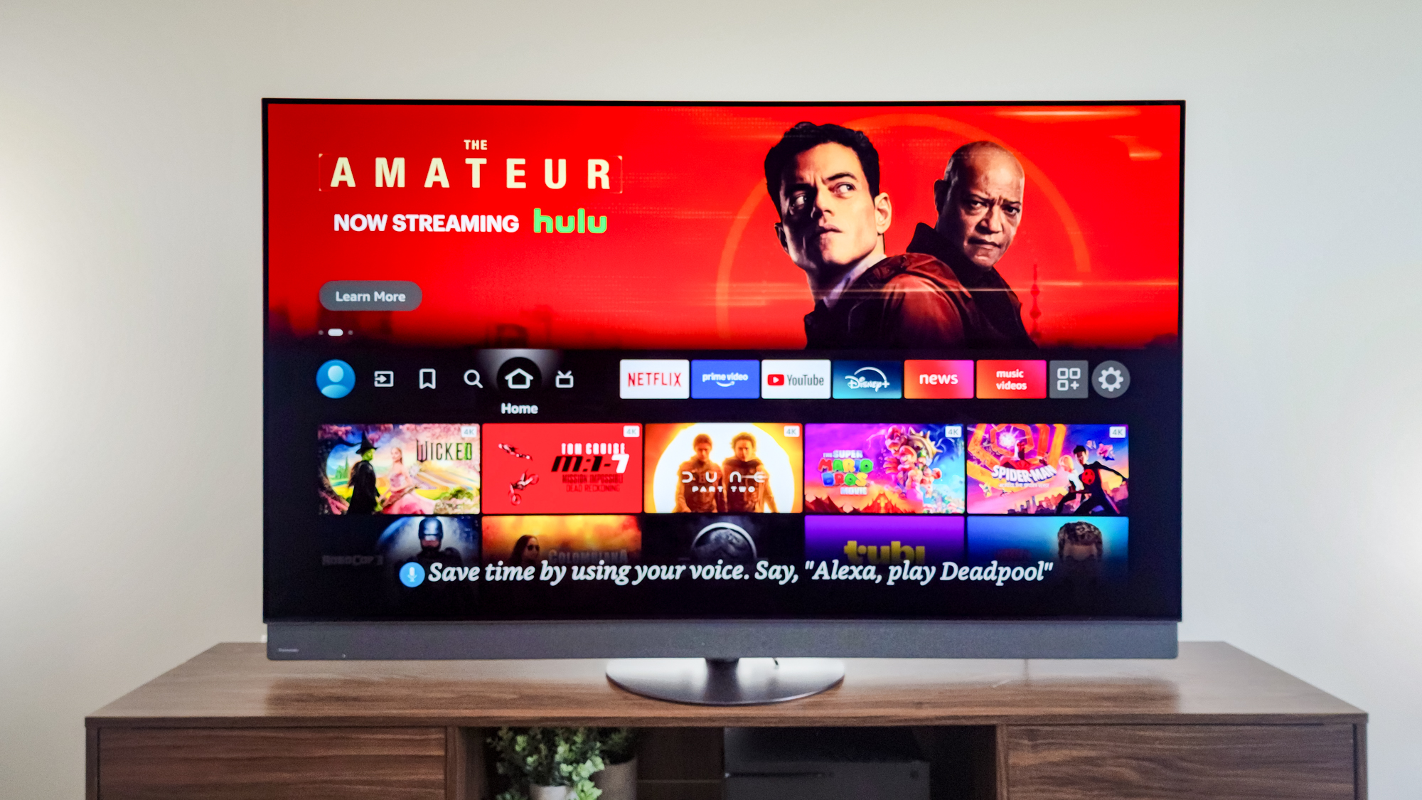 A Panasonic Z95B OLED TV on a side table.