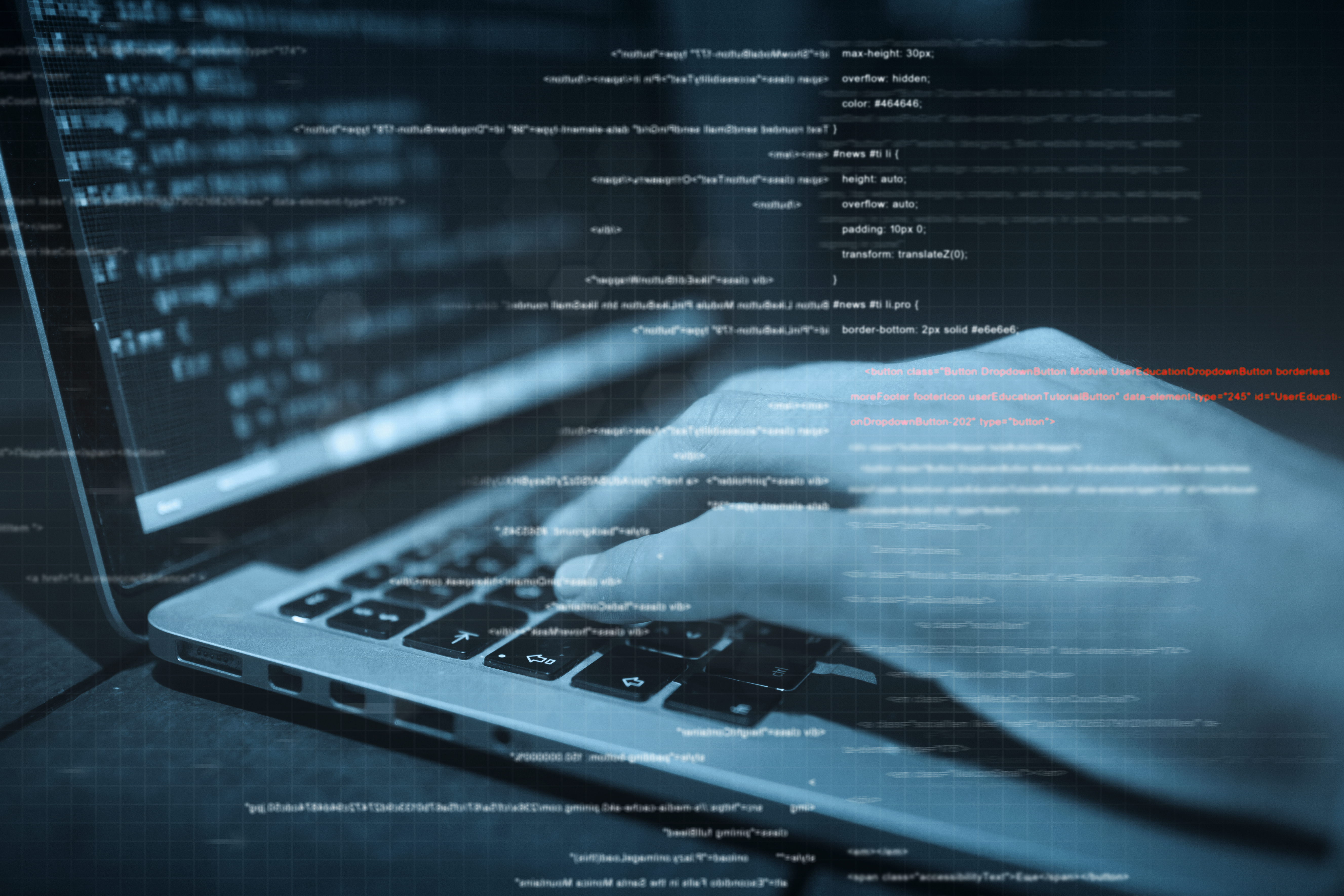hacker hands at work with interface around