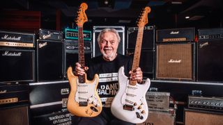Randy Bachman holding his 1968 and 1954 Fender Stratocasters