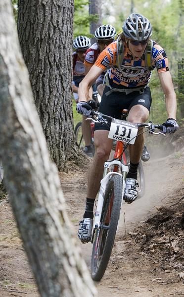 Barry Wicks (Kona), shadowed by teammates Chris Peariso and Darrin Braun (Adventure 212 / Specialized), hits the dirt at the WORS Crystal Lake Classic. Wick went on to take the win in three laps.