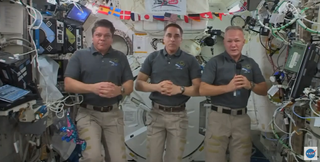 NASA astronauts Bob Behnken, Chris Cassidy and Doug Hurley answer questions on July 31, 2020, from the International Space Station in advance of Behnken and Hurley's departure for Earth the next day.