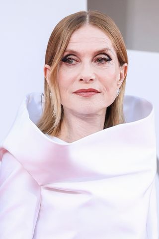 Isabelle Huppert is pictured with a sleek, tucked bob look at the Closing Ceremony red carpet during the 81st Venice International Film Festival at Palazzo del Cinema on September 07, 2024 in Venice, Italy.