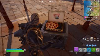 Destroying one of the Fortnite evil brainwashing pizza turntables