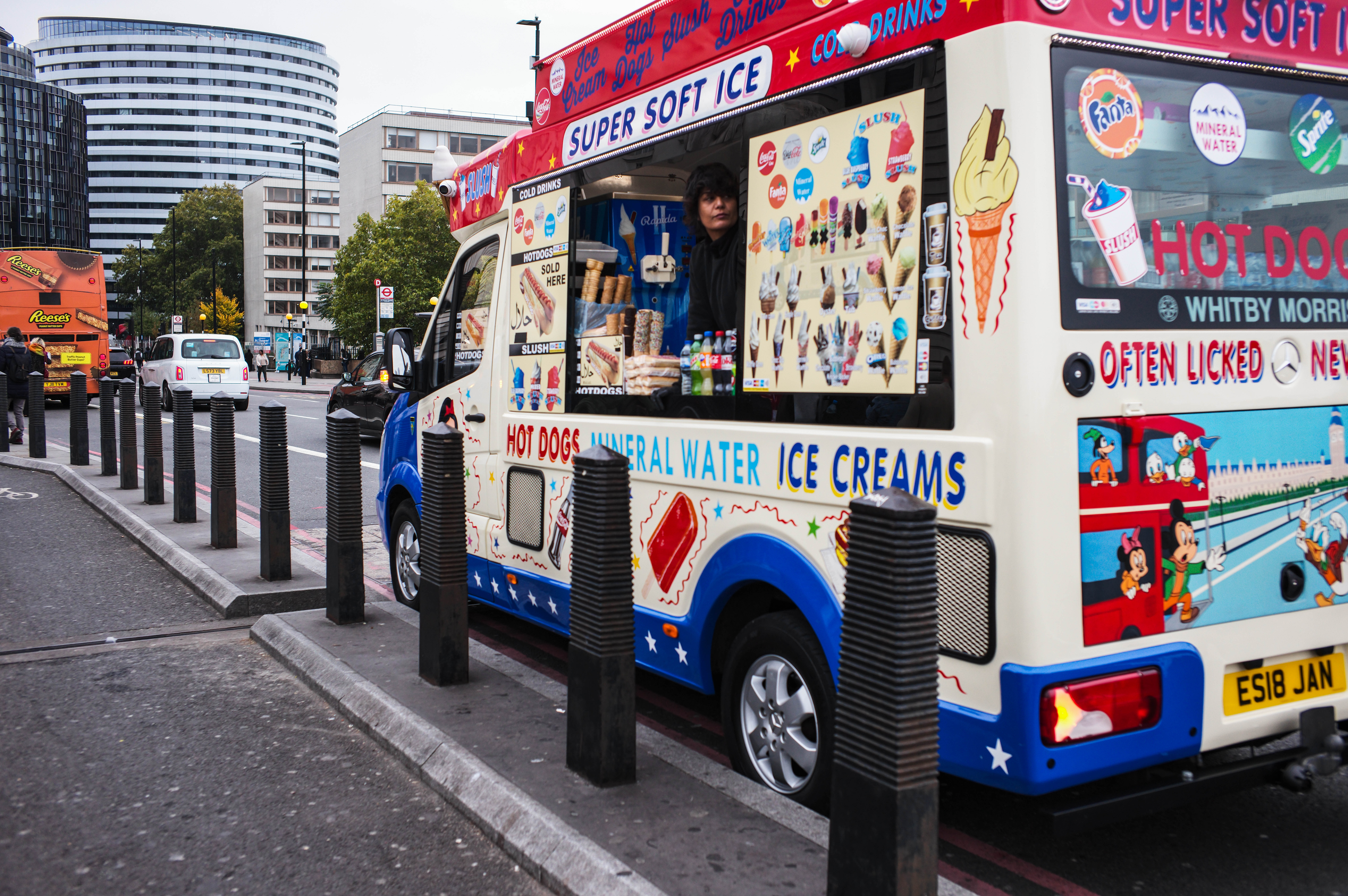 And ice cream seller leaning out of their van