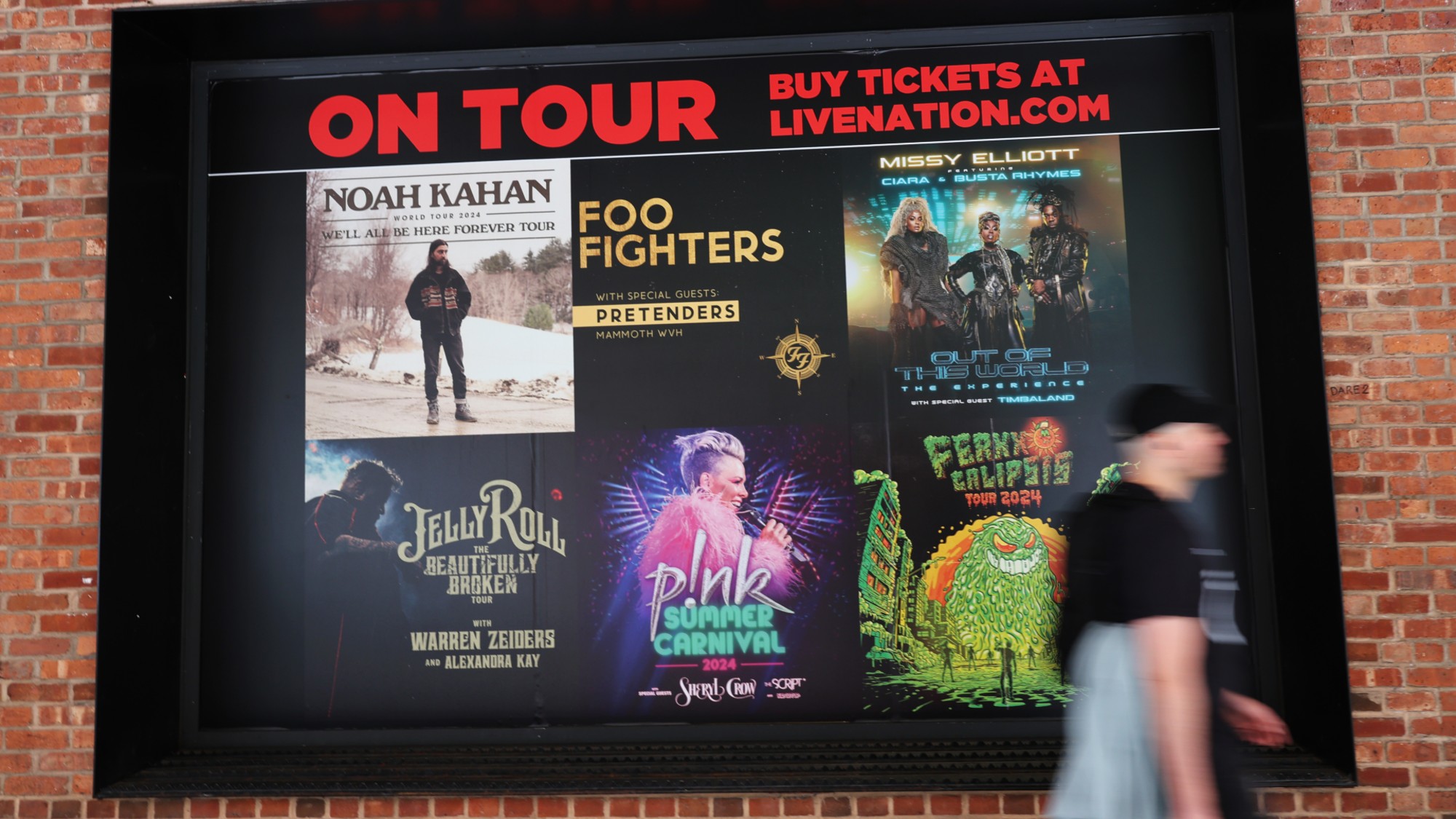 NEW YORK, NEW YORK - MAY 23: Signs are seen at the Live Nation NYC headquarters on May 23, 2024 in New York City. The Department of Justice has filed a federal lawsuit that accuses Ticketmaster and its parent company Live Nation of illegally monopolizing the live entertainment industry to the detriment of concertgoers and artists alike. The lawsuit seeks to structure how the company operates and includes breaking apart the two entities. (Photo by Michael M. Santiago/Getty Images)