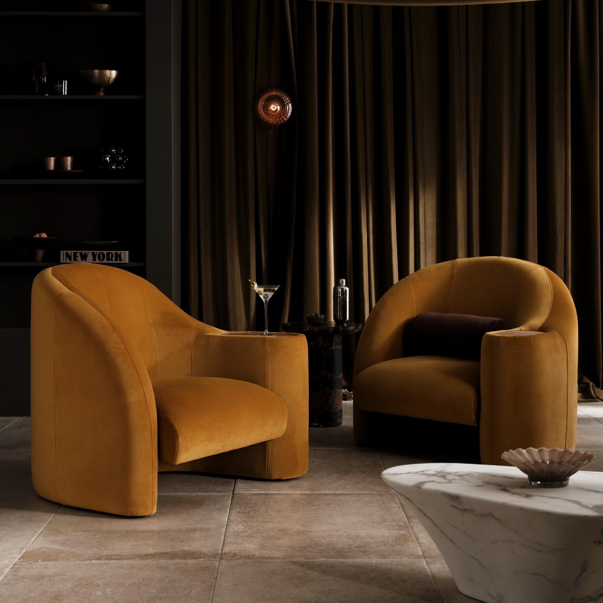 Two Stellar armchairs with a built-in side table from Sofa.com in a formal living room