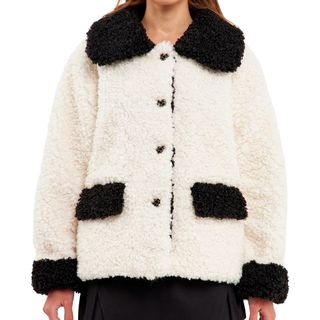 model wearing Endless Rose Shearling Jacket in black and white 