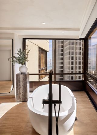 A modern-looking bathtub overlooking San Francisco's skyline