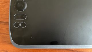 Ugee M908 review; a close up of a drawing tablet bezel