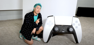 ZHC stands besides his new 500lb, 10-foot PS5 console