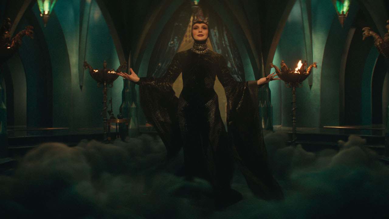 The Evil Queen (Gal Gadot) basks in her power in Snow White.