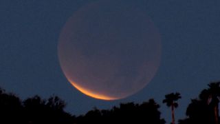 Skywatcher Charles R. Jones II took this photo of the total lunar eclipse Dec. 10 from Phoenix, Ariz.