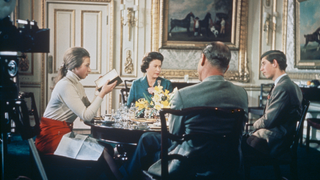 Queen Elizabeth II lunches with Prince Philip and their children Princess Anne and Prince Charles at Windsor Castle in Berkshire, circa 1969