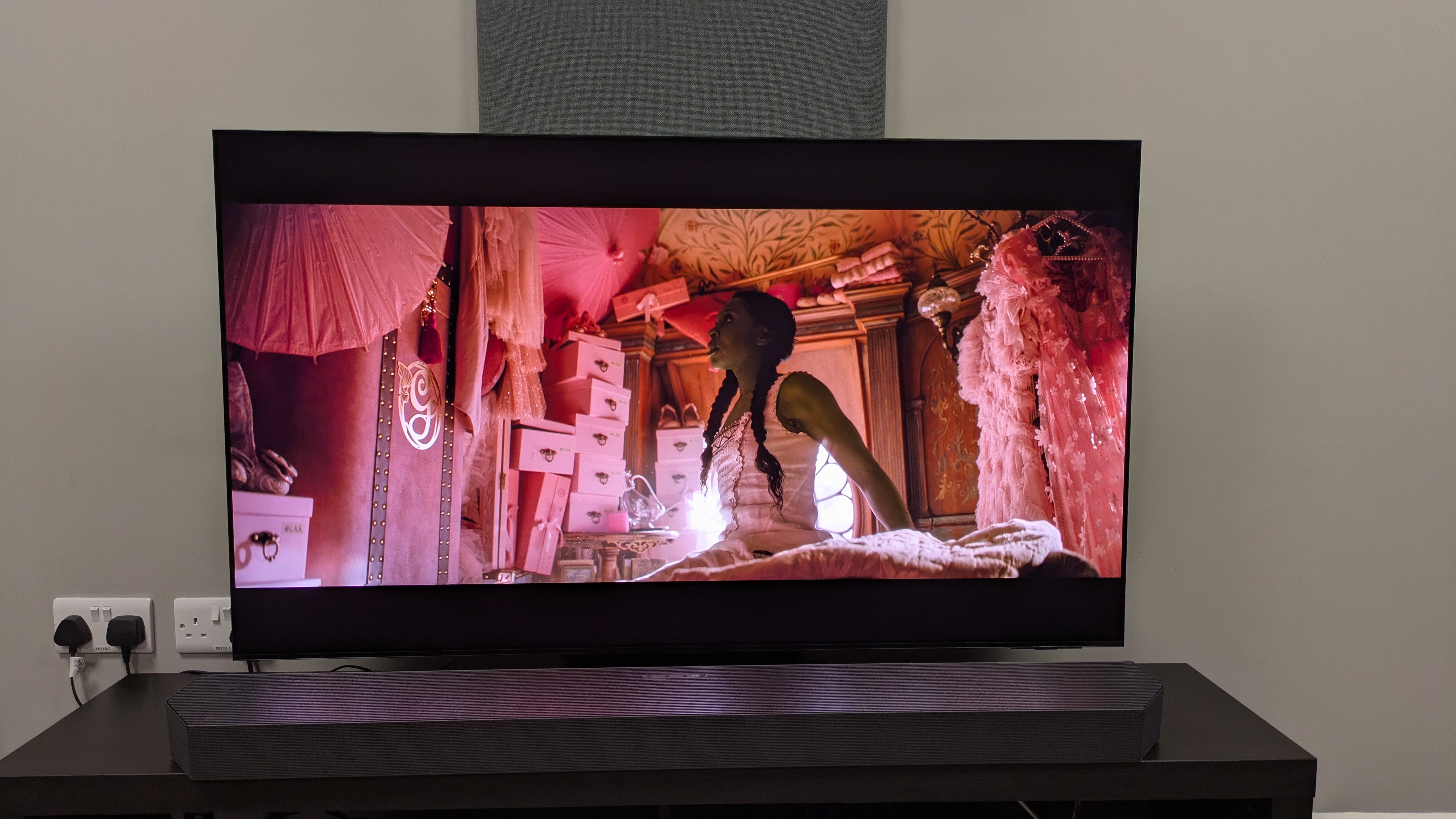 Samsung HW-Q990F connected to the Samsung S95F with Elphaba from Wicked on screen