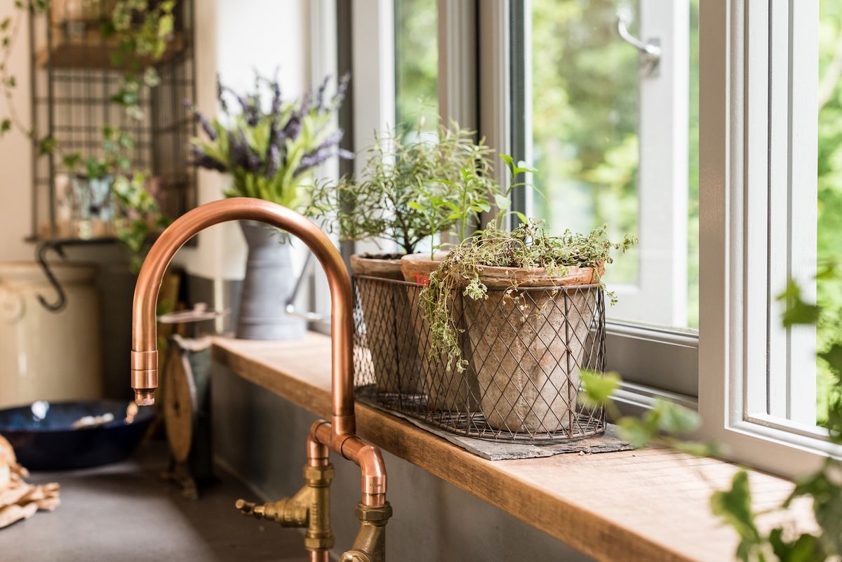 copper tap in rustic kitchen