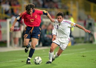 Spain's Joseba Etxeberria holds off France's Bixente Lizarazu at Euro 2000.