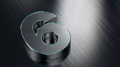 The number six outlined in green against a slate background.