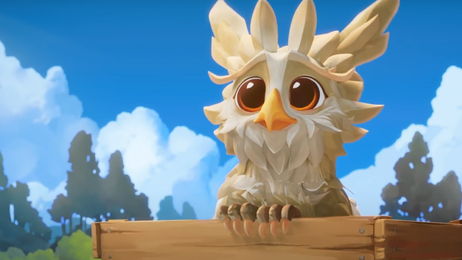 A little gryphon from Fantastic Haven pokes its wide-eyed head out of a box.