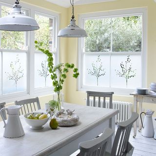 dining room with white table and chairs