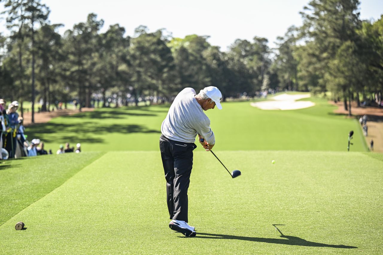 Fred Couples hits a tee shot on the 1st hole at Augusta National