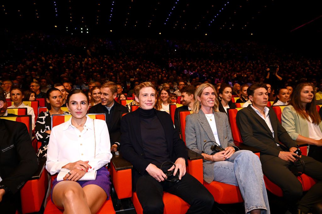PARIS FRANCE OCTOBER 25 LR Juliette Labous of France and Team DSMFirmenich Jonas Vingegaard of Denmark and Team JumboVisma and Demi Vollering of The Netherlands and Team SD Worx during the 111th Tour de France 2024 3rd Tour de France Femmes 2024 Route Presentation UCIWT UCIWWT on October 25 2023 in Paris France Photo by Dario BelingheriGetty Images