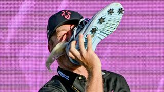 Talor Gooch drinks from a shoe after his victory at LIV Golf Adelaide