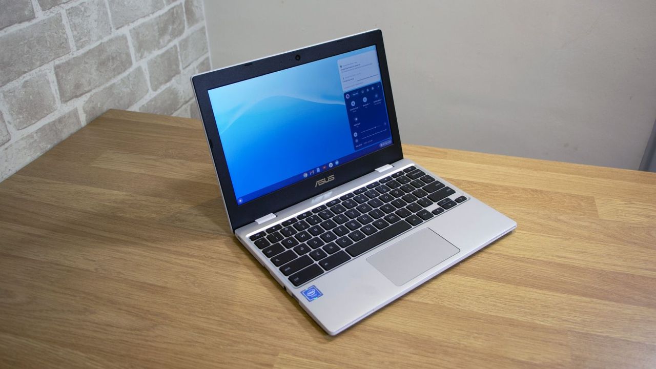 A photograph of the Asus Chromebook CX1 open on a table from above