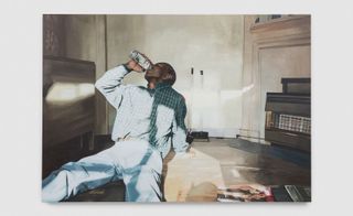 artwork of man sitting on floor, drinking