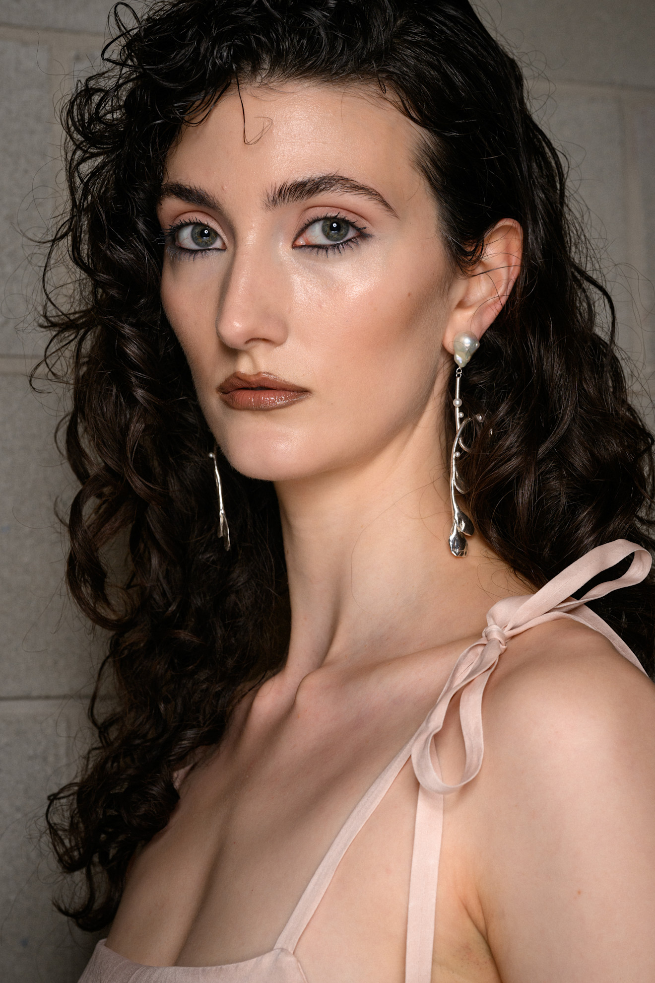 A model wearing their hair in a shag haircut.