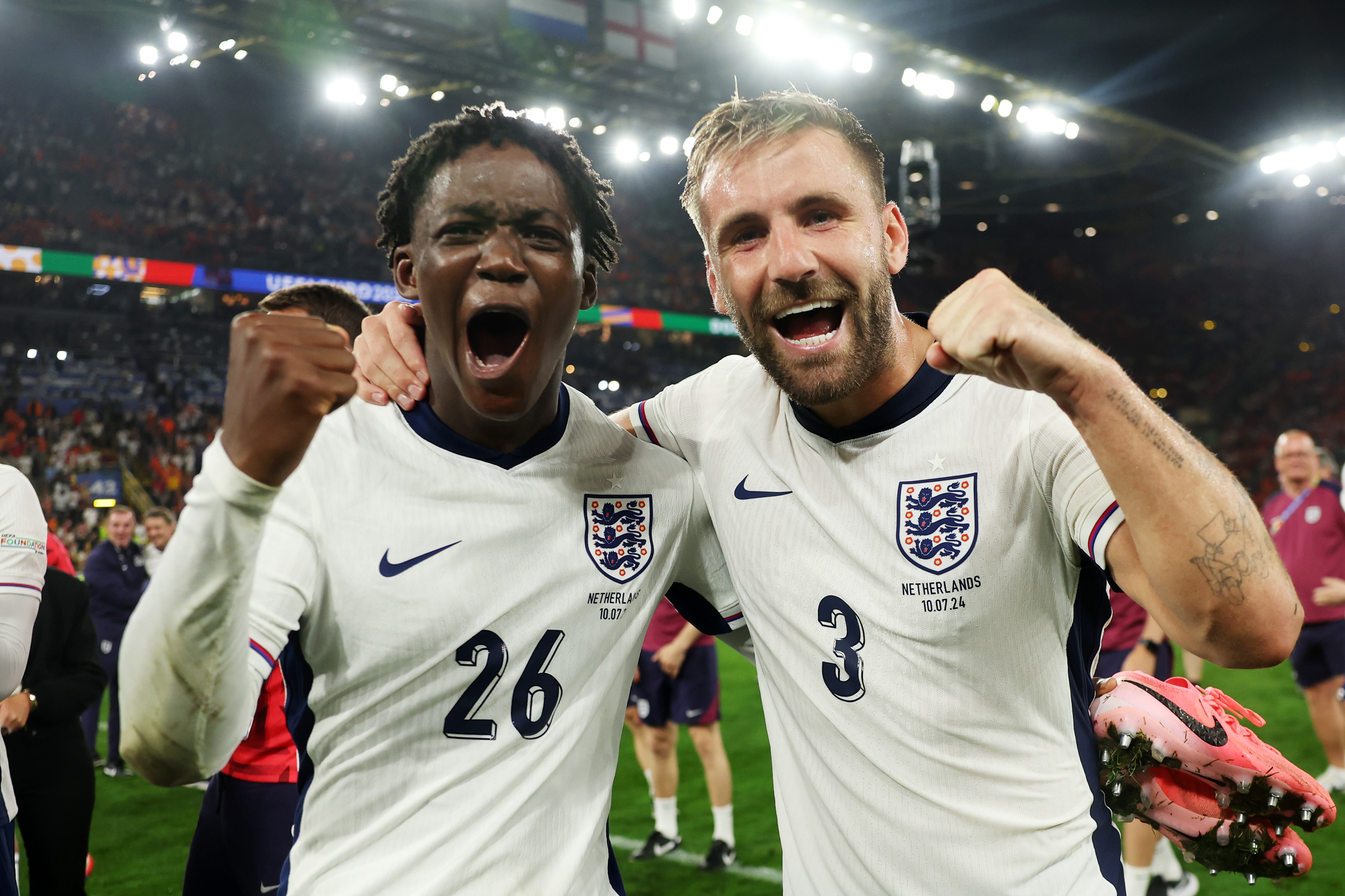 Kobbie Mainoo (left) and Luke Saw (right) celebrate England reaching the final of Euro 2024