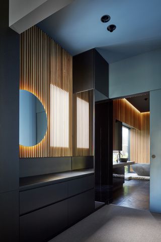 bathroom with black and blue walls