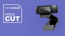Logitech C920x HD Pro Webcam on purple background with price cut sign