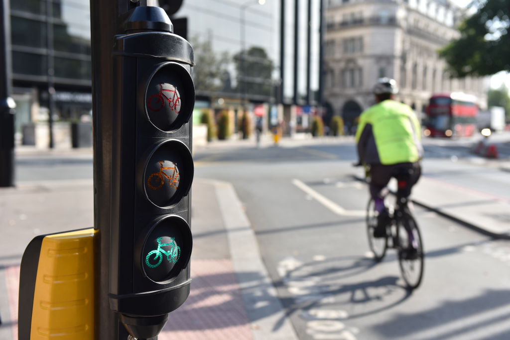 Cycling at a green traffic light