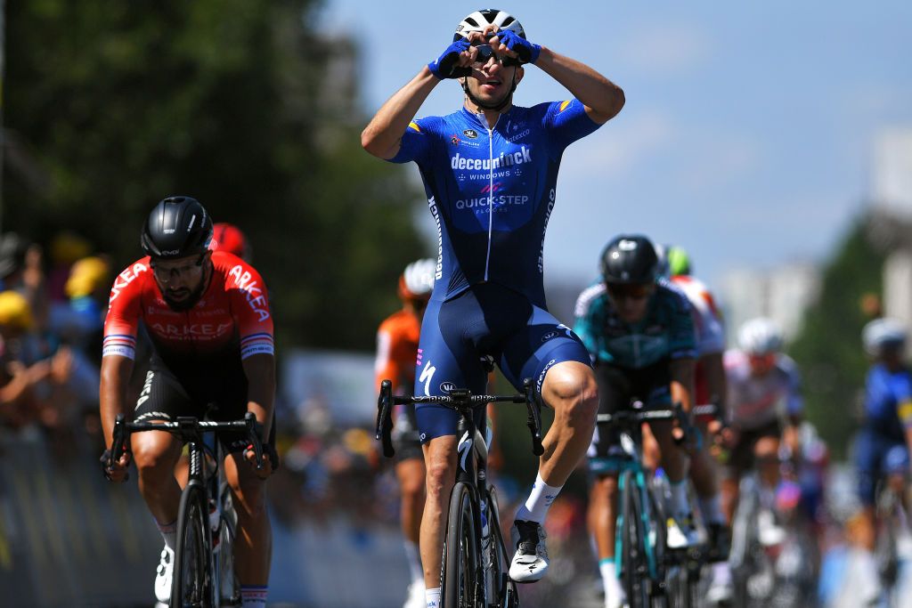 BOURGENBRESSE FRANCE JULY 29 lvaro Jos Hodeg Chagui of Colombia and Team Deceuninck QuickStep celebrates at finish line as stage winner ahead of Nacer Bouhanni of France and Team Arka Samsic L during the 33rd Tour de lAin 2021 Stage 1 a 1391km stage from Parc des Oiseaux to BourgenBresse 237m tourdelain on July 29 2021 in BourgenBresse France Photo by Luc ClaessenGetty Images
