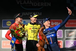 WAREGEM BELGIUM MARCH 27 LR Jonas Abrahamsen of Norway and Team UnoX Mobility on second place race winner Matteo Jorgenson of The United States and Team Visma Lease a Bike and Stefan Kung of Switzerland and Team Groupama FDJ on third place pose and take a selfie on the podium ceremony after the 78th Dwars Door Vlaanderen 2024 Mens Elite a 1886km one day race from Roeselare to Waregem UCIWT on March 27 2024 in Waregem Belgium Photo by Tim de WaeleGetty Images