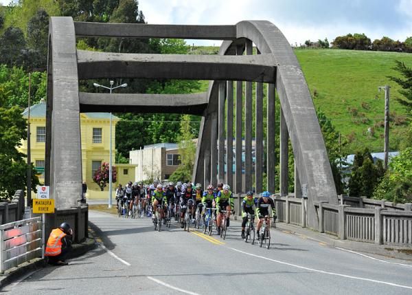 Riders cross the bridge at Mataura