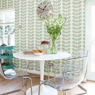 kitchen with dining table and chairs retro-style wallpaper classic otem by orla kiely and flooring is a sleek and practical laminate