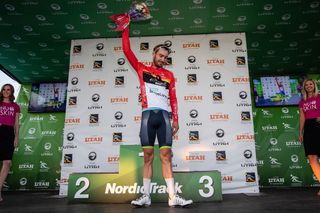Hayden McCormick (Team Bridgelane) on the podium for most aggressive rider after stage 4 at the Tour Utah