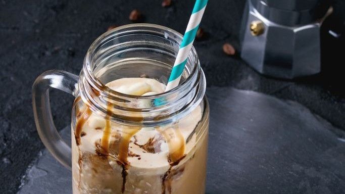 Starbucks style drink a jar type glass with straw