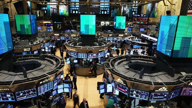 Traders work the floor of the New York Stock Exchange