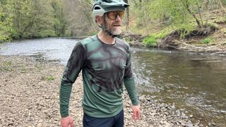 7Mesh Roam LS jersey being worn by a man near a river