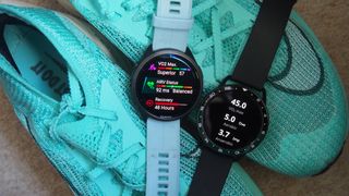 Garmin smartwatches with VO2 Max readings on a pair on trainers 