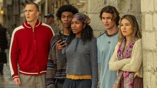 From left to right: (L to R) Drew Starkey as Rafe, Jonathan Daviss as Pope, Carlacia Grant as Cleo holding a phone, Chase Stokes as John B, Madelyn Cline as Sarah Cameron in Season 5 of Outer Banks.