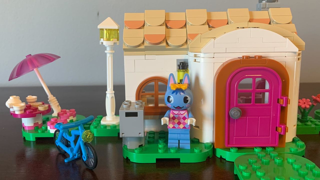 Lego Nook's Cranny &amp; Rosie's House set on a wooden surface