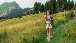 Woman wearing shorts and tshirt hiking