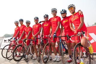The Chinese national team lines up for the day's start.