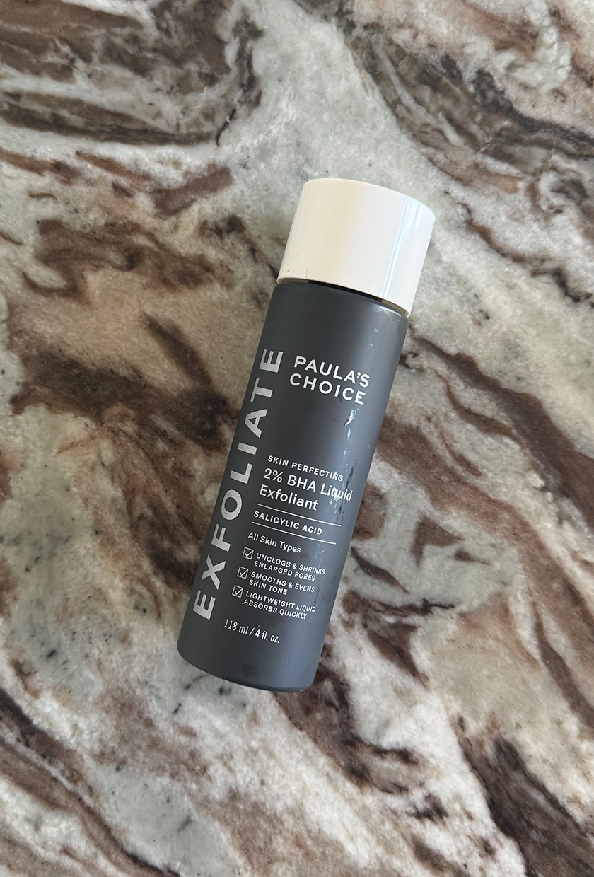 A photo of Paula&#039;s Choice BHA exfoliator on a marble table