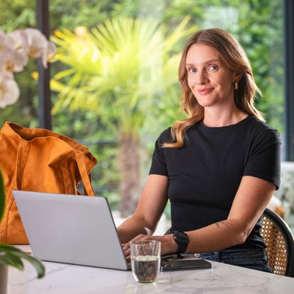 A woman uses EE technology