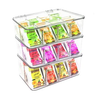 A stack of three acrylic organizers with tea bags in them