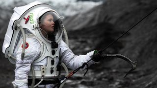 Helga Kristín climbed up the face of a glacier wearing a Mars analog spacesuit.